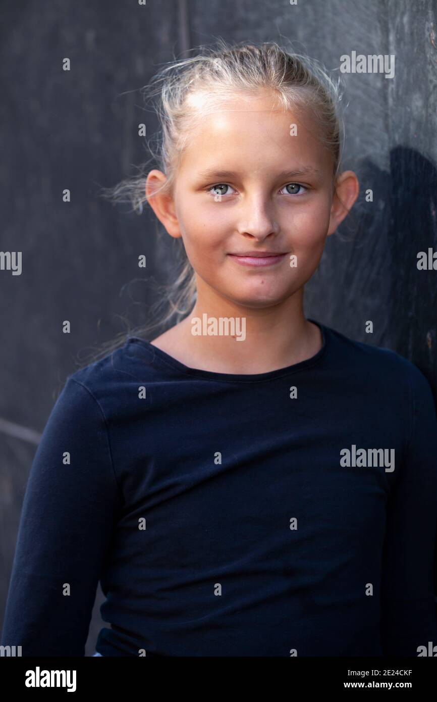 Portrait of girl looking at camera Stock Photo - Alamy