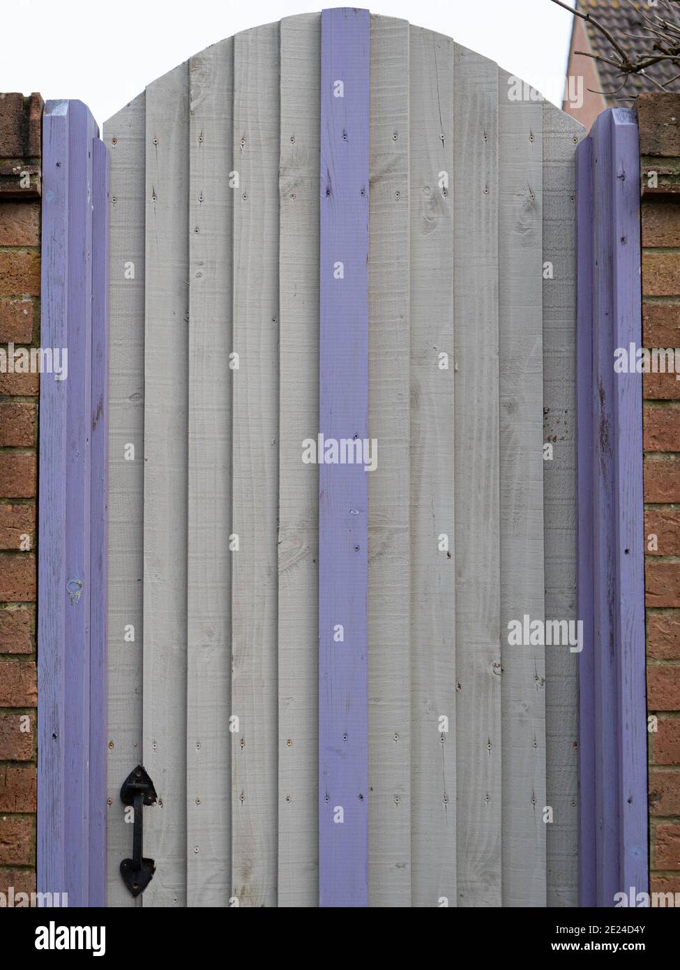 Unusual painting of garden gate on local housing estate in Westbury, Wiltshire, England, UK. Stock Photo