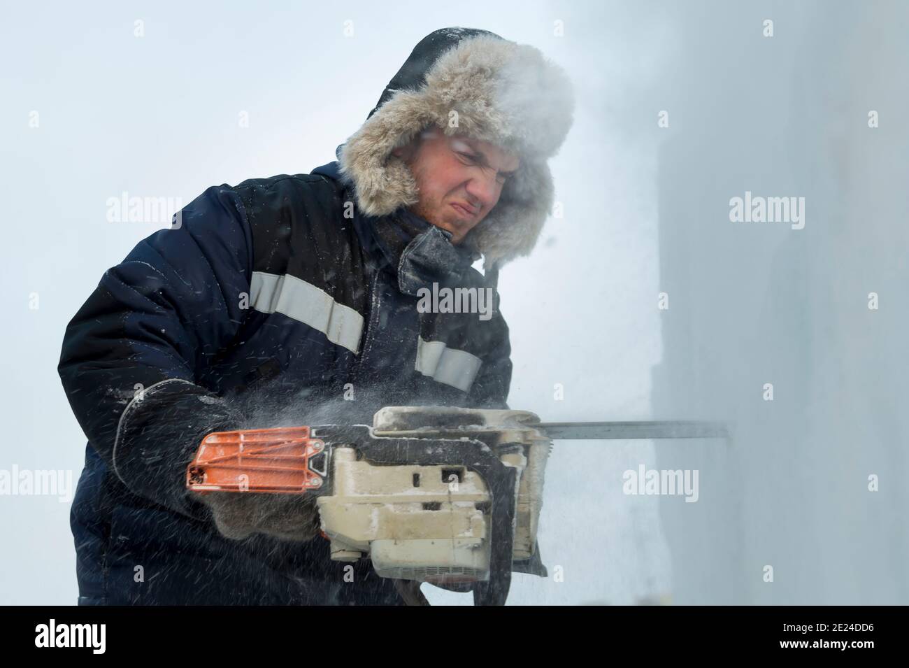 Workman assembler customize chainsaw ice plate Stock Photo Alamy
