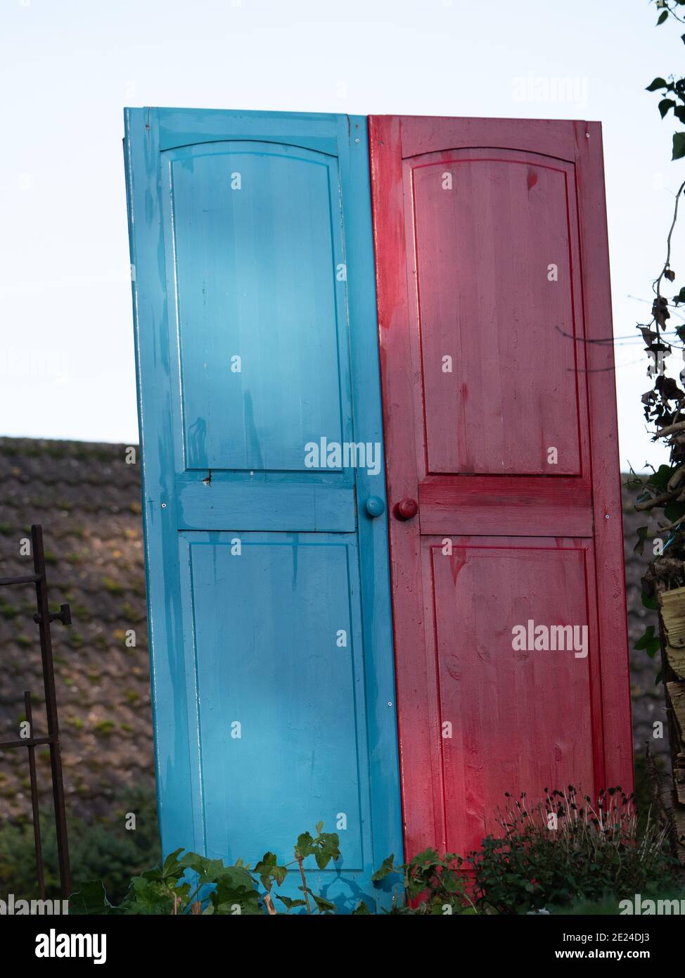 A quirky garden decoration of coloured doors in Westbury, Wiltshire
