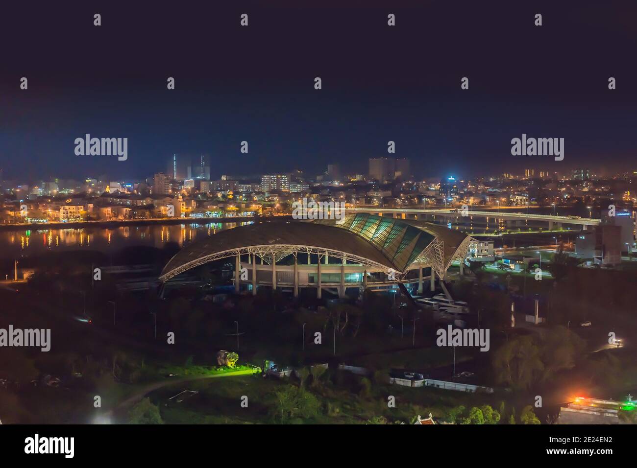 The architecture shimmering under the night-lit city makes the city more vibrant in Da Nang, Vietnam Stock Photo