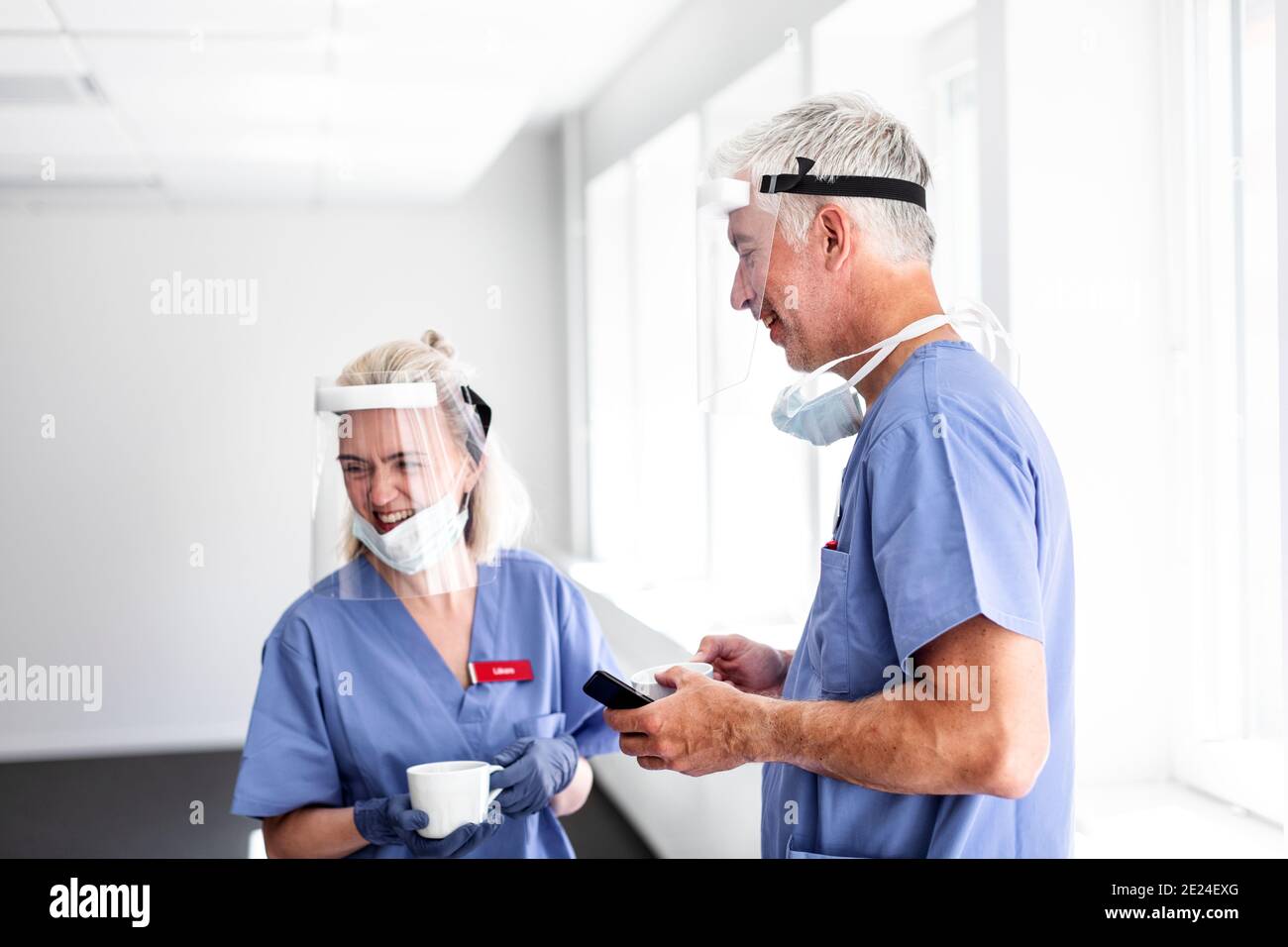 Doctors wearing personal protective equipment Stock Photo