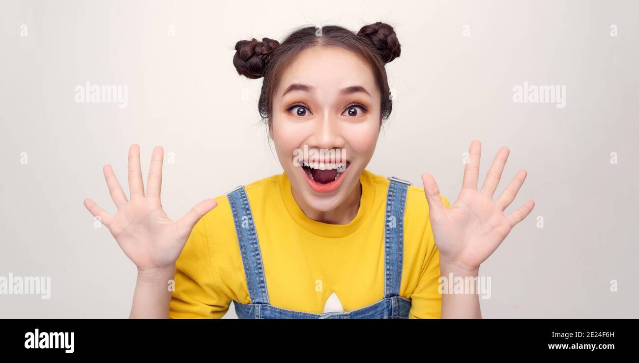 Portrait of beautiful surprised woman on white background Stock Photo ...