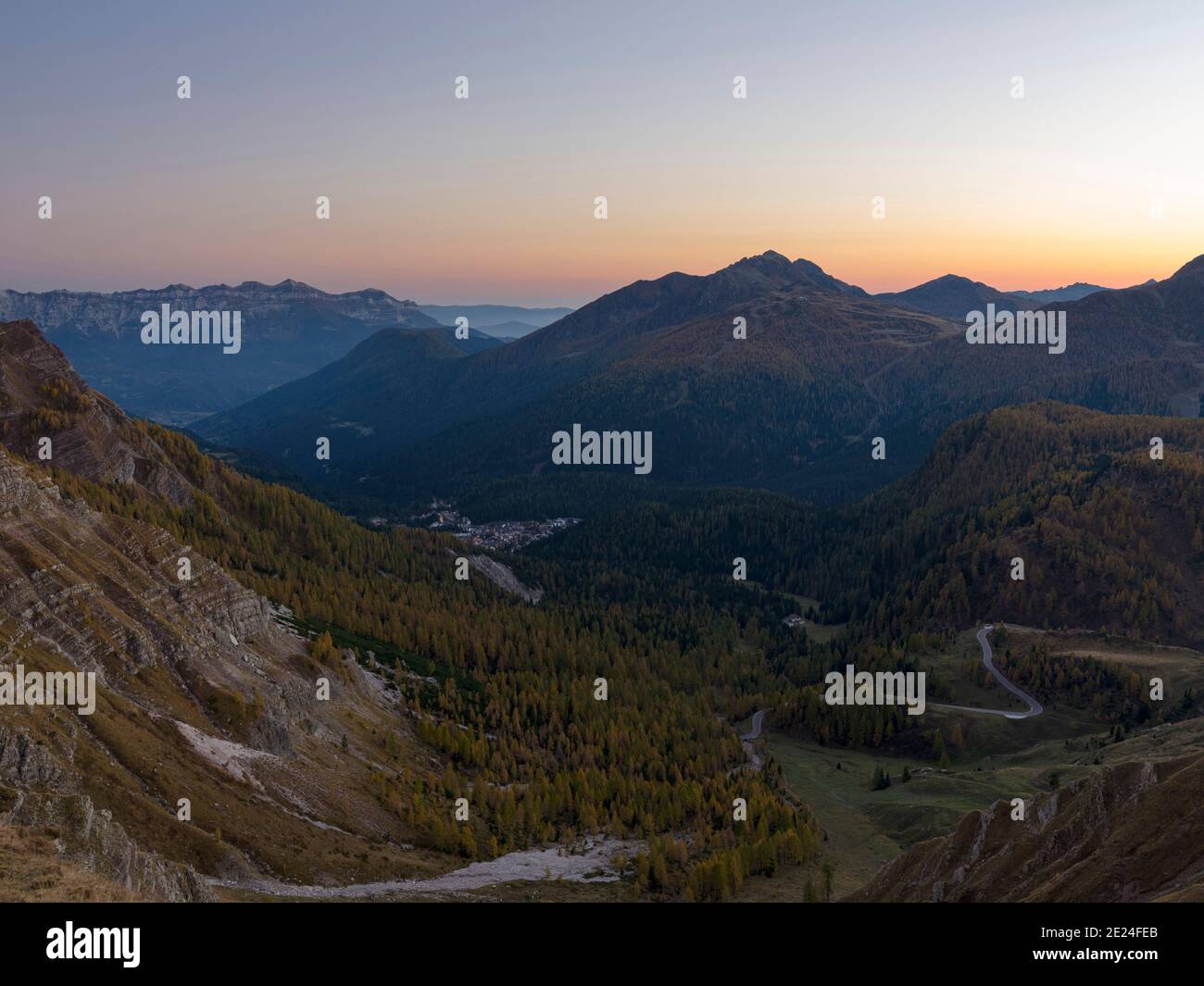 Val Cismon and San Martino di Castrozza during sunset.  Pala mountain range (Pale di San Martino) in the dolomites of Trentino. Pala is part of the UN Stock Photo