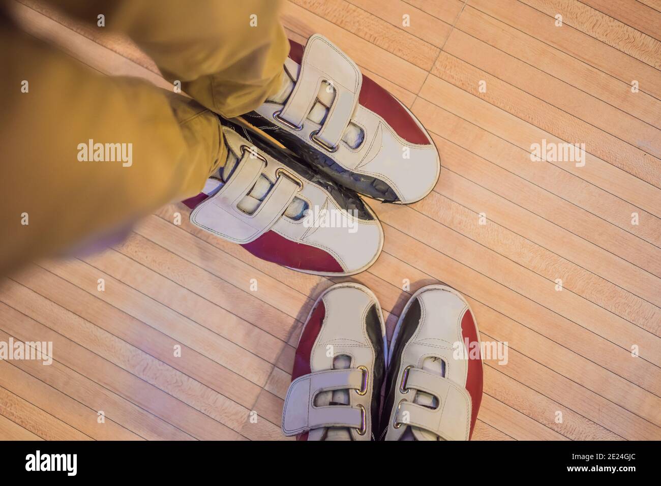 Family in bowling shoes. Family time together Stock Photo