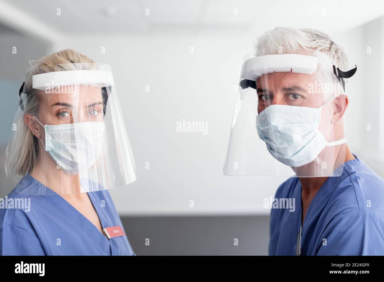 Doctors wearing personal protective equipment Stock Photo