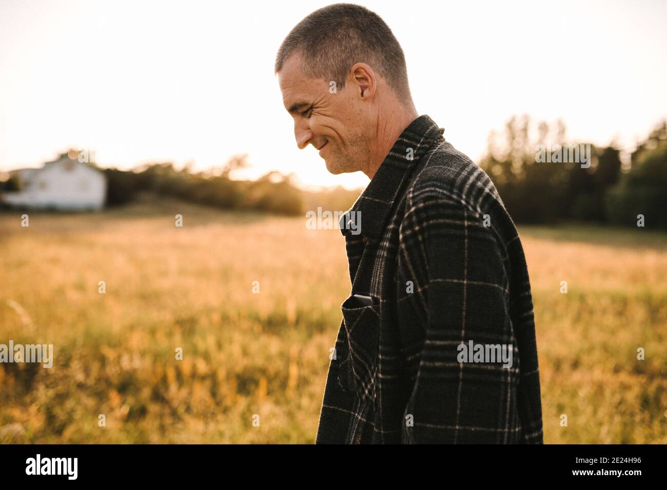 Smiling man looking away Stock Photo