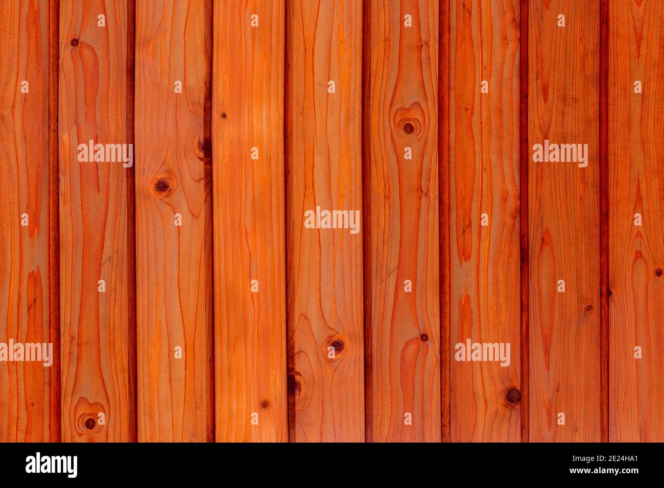 Old wood wall panel pattern. Natural interior brown wooden panel background and texture. Stock Photo