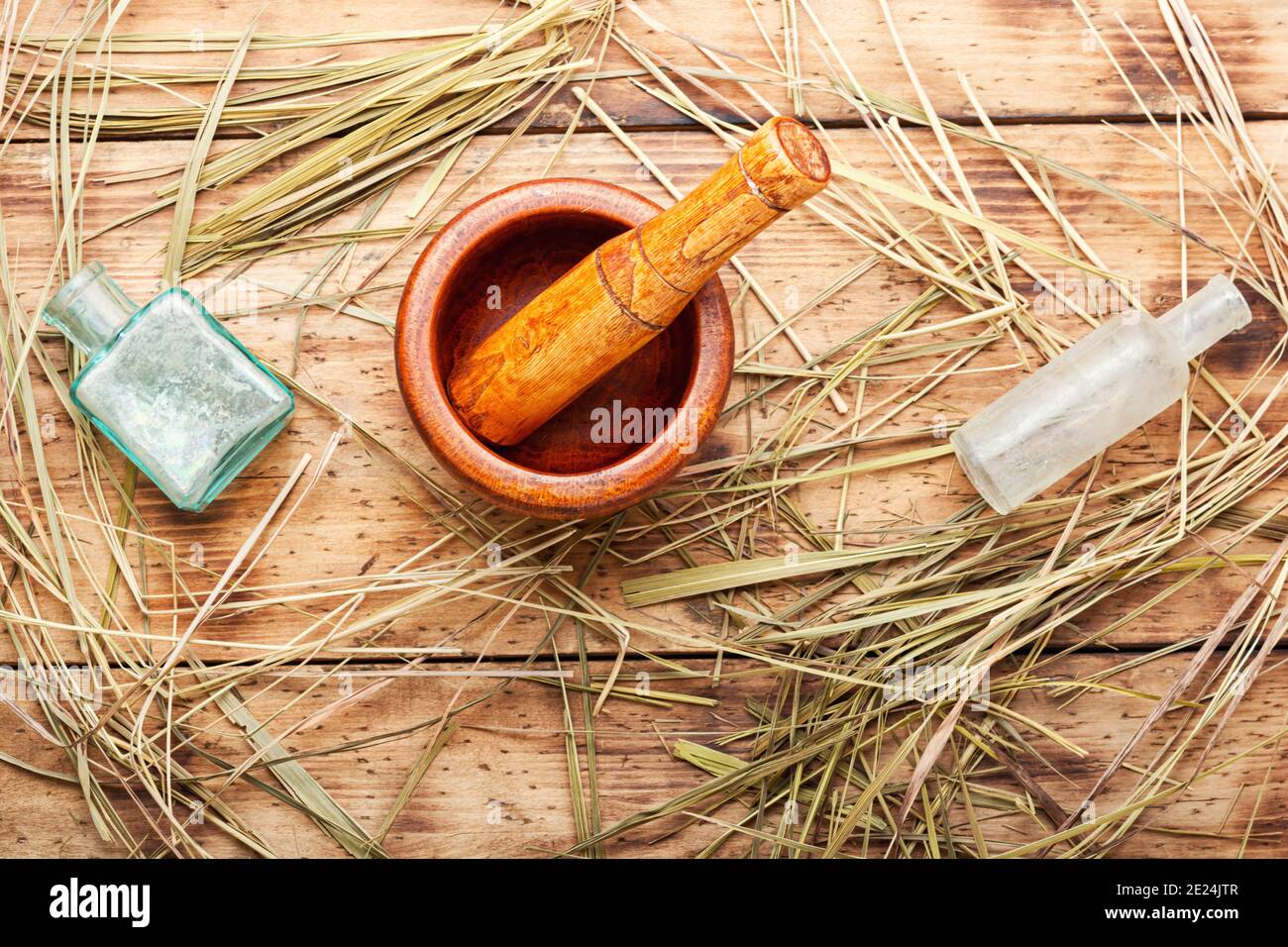 Mortar with medicinal herb sweetgrass or holy grass.Herbal medicine.Herbalism Stock Photo