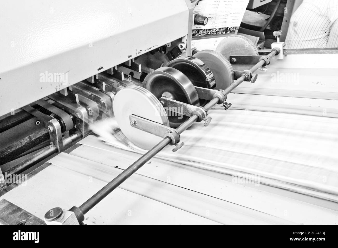 Folding machine working in printing industry Stock Photo