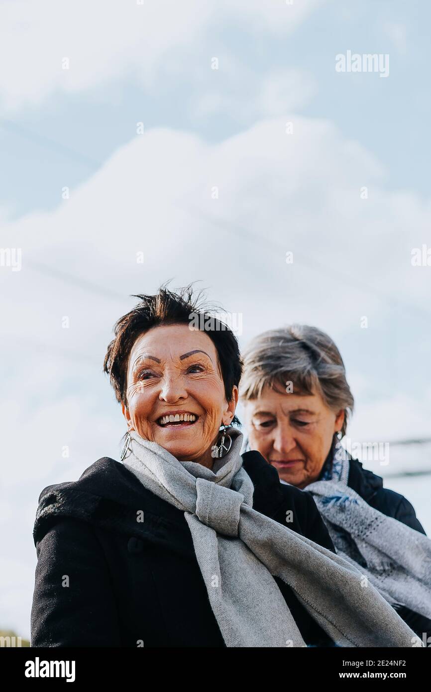 Smiling woman looking away Stock Photo