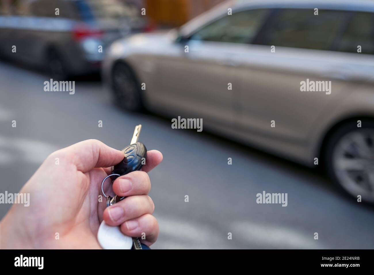 Hand holding car key Stock Photo