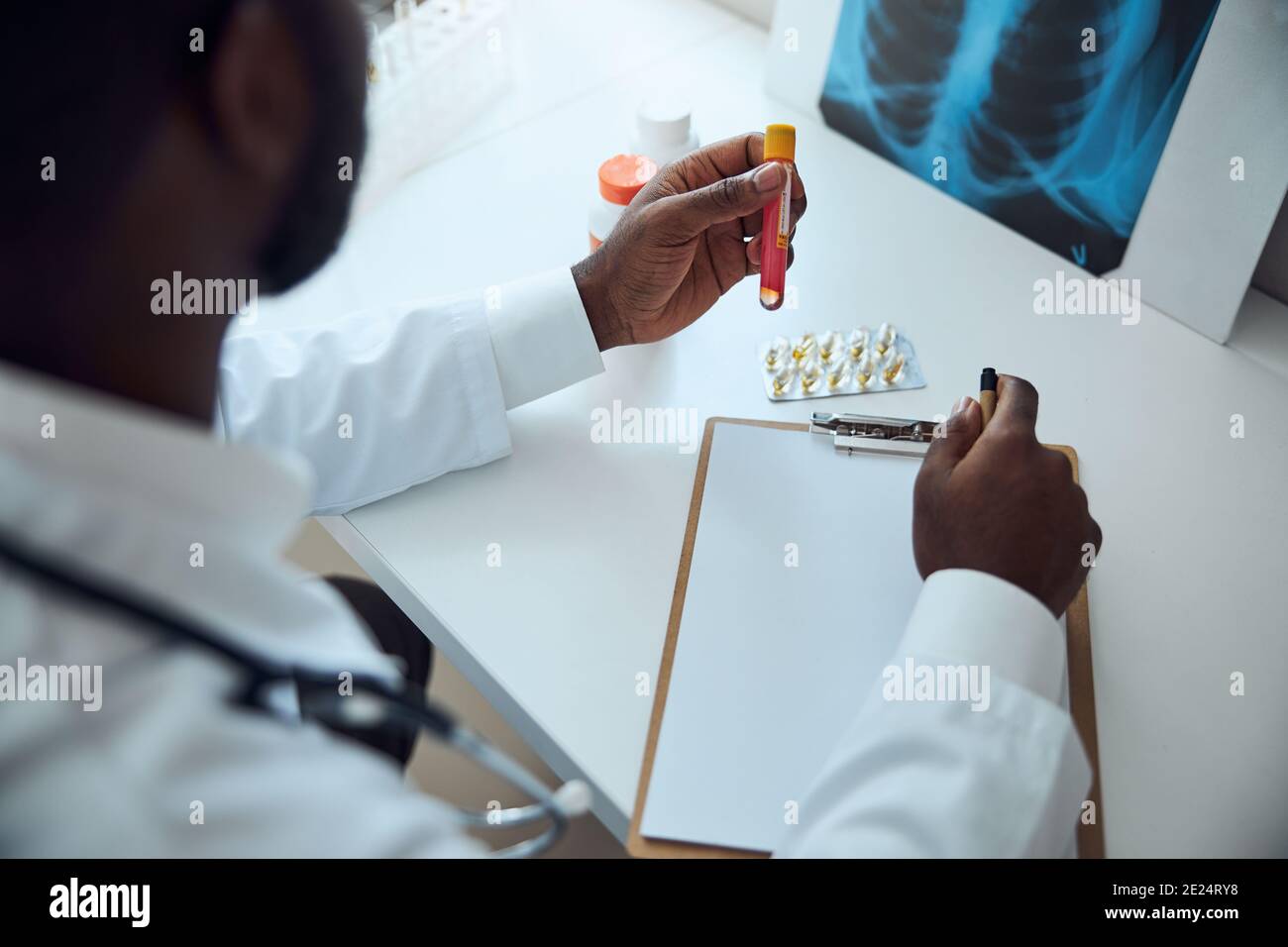 Doctor is taking a vaccine test tube Stock Photo