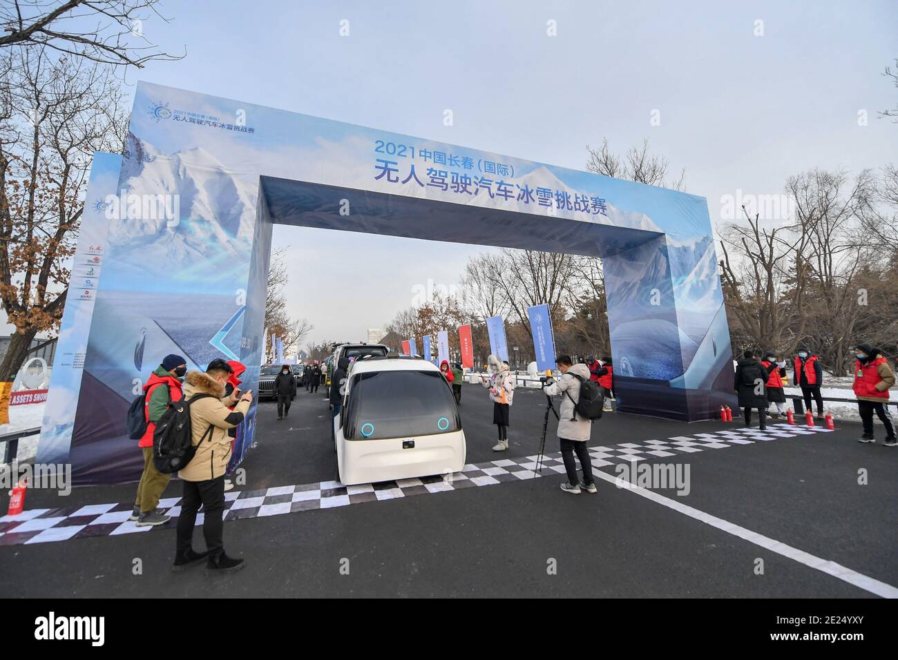 Changchun, China's Jilin Province. 12th Jan, 2021. Driverless vehicles are seen during a driverless vehicle winter challenge competition at a forest park in Changchun, northeast China's Jilin Province, Jan. 12, 2021. The competition kicked off here on Tuesday, aiming to check the performance of those driverless vehicles under harsh weather in winter. Credit: Zhang Nan/Xinhua/Alamy Live News Stock Photo