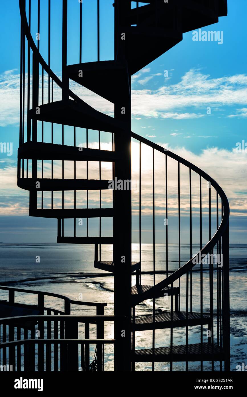 Spiral staircase at the Obereversand lighthouse with the Wadden Sea in the background, Dorum-Neufeld, Lower Saxony, Germany, Europe Stock Photo