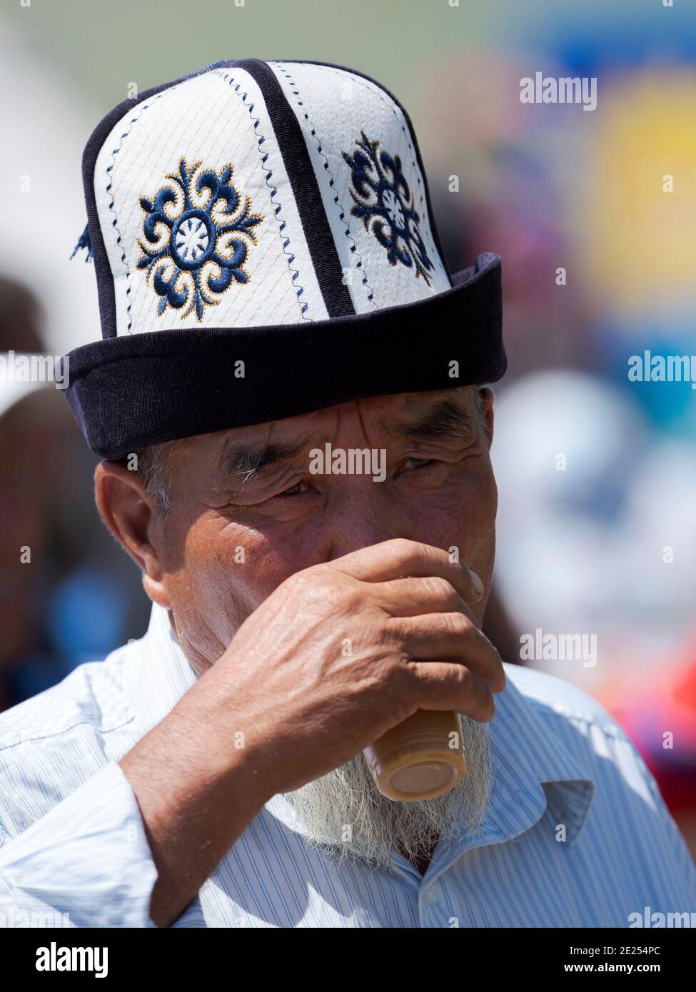 Man with traditional white felt hat 