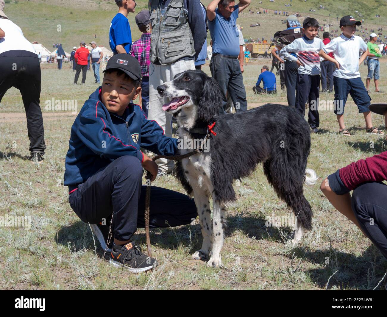 Breeders of kyrgysz hunting dog, Taigan, during a competition. Folk and Sport festival on the Suusamyr plain commemorating Mr Koshomkul, a sportsman a Stock Photo