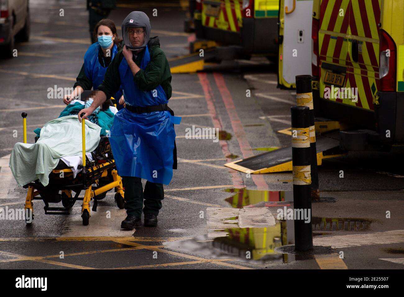 IMAGE PIXELATED BY PA PICTURE DESK Ambulance crews transport patients into City Hospital in Birmingham. The West Midlands has several areas in the top 10 highest-growing coronavirus numbers. Stock Photo