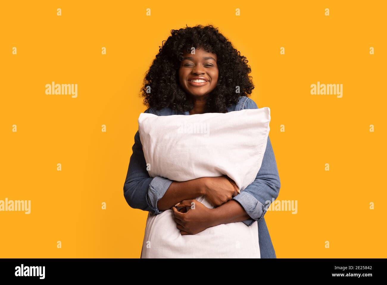 Beautiful woman hugging pillow hires stock photography and images Alamy