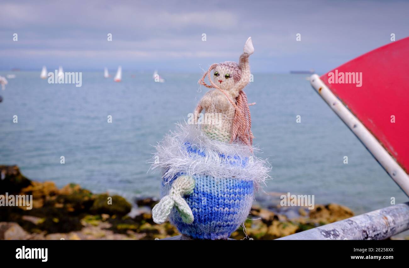 A knitted mermaid photographed at Seaview on the Isle of Wight, UK Stock Photo