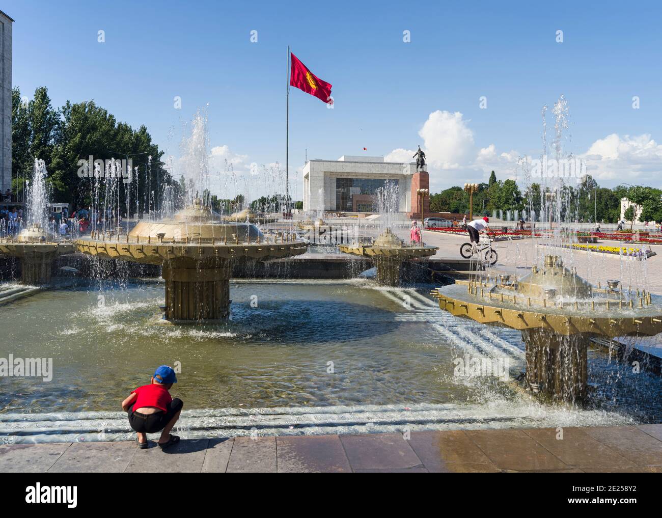 Ala Too in the city center. Background the National Museum and the monument of the national hero Manas 'Aykol Manas'. The capital Bishkek located in t Stock Photo