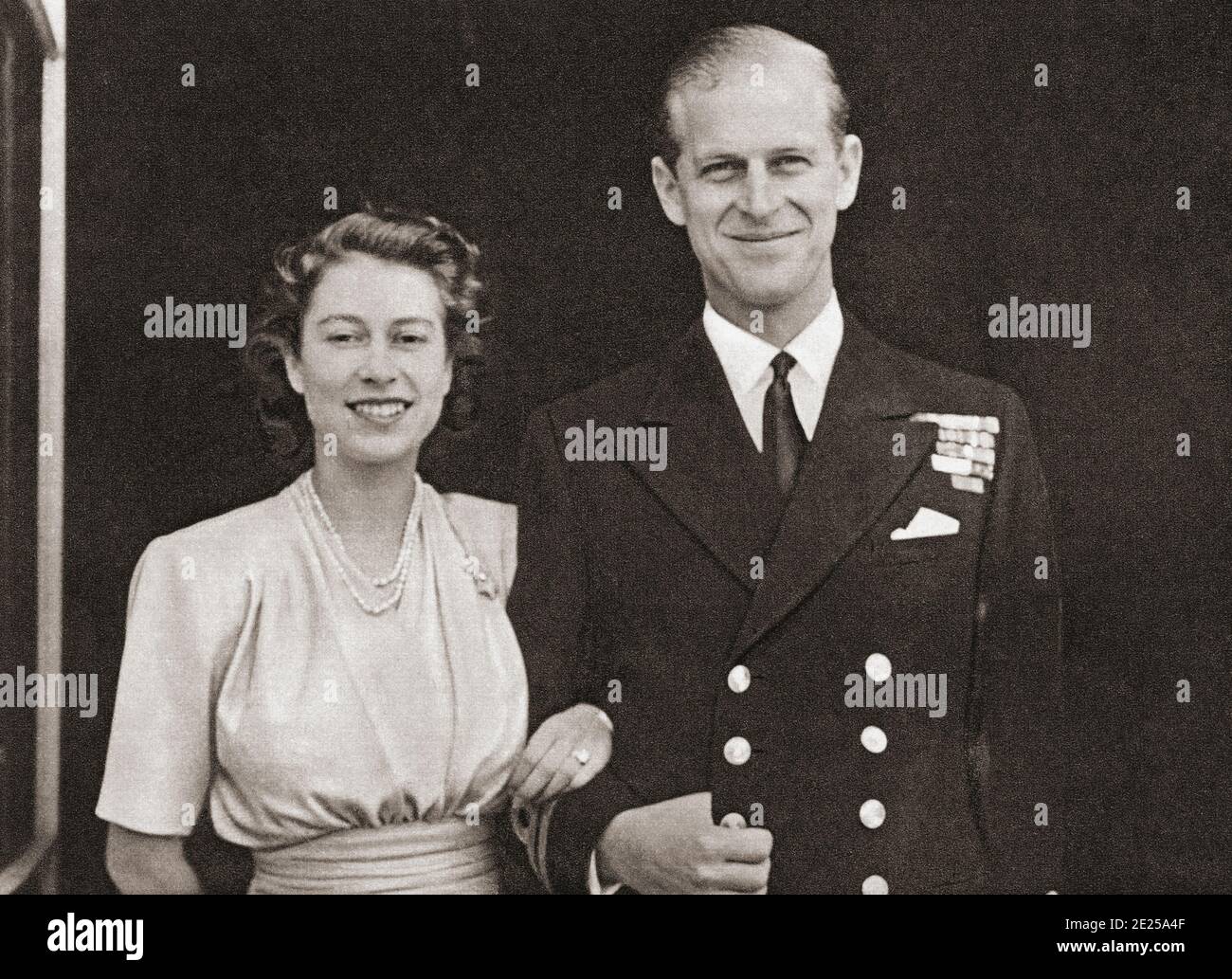 EDITORIAL ONLY Princess Elizabeth of York and the Duke of Edinburgh, seen here on the announcement of their engagement in 1947. Princess Elizabeth of York, future Elizabeth II, born 1926.  Queen of the United Kingdom.  Prince Philip, Duke of Edinburgh (born Prince Philip of Greece and Denmark,1921- 2021). Future husband of Queen Elizabeth II of the United Kingdom and other Commonwealth realms.  From The Queen Elizabeth Coronation Book, published 1953. Stock Photo