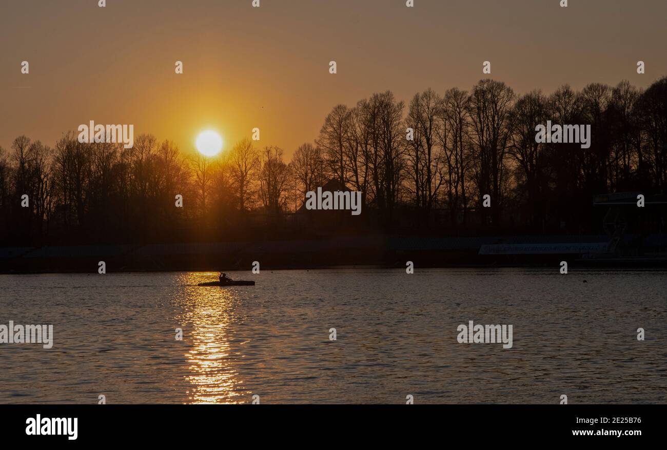 Canoe at sunset Stock Photo