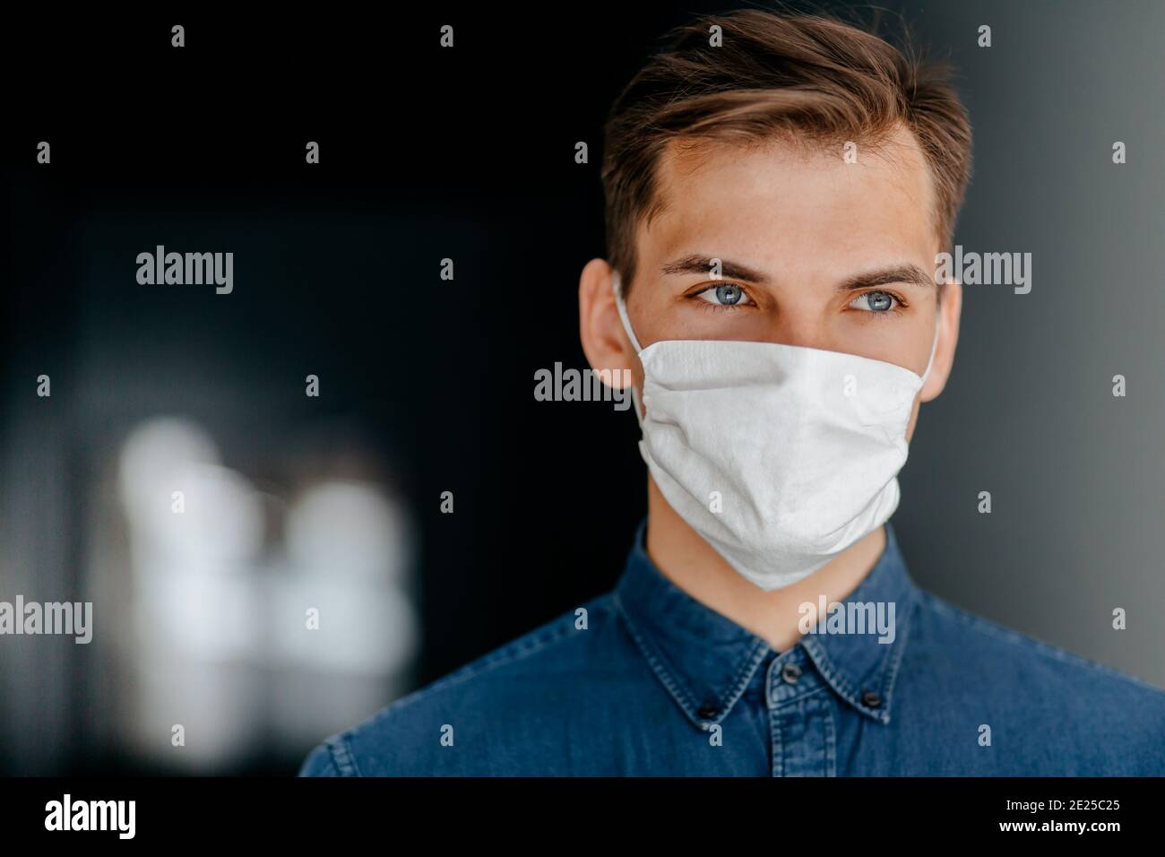 close up. young man in a protective mask Stock Photo - Alamy