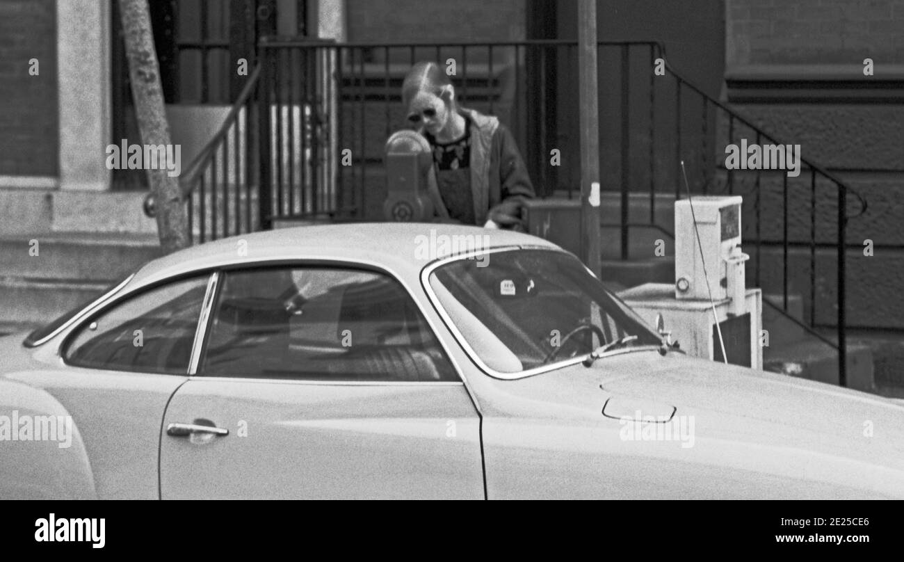 Woman pays for parking, Philadelphia, USA, 1976 Stock Photo