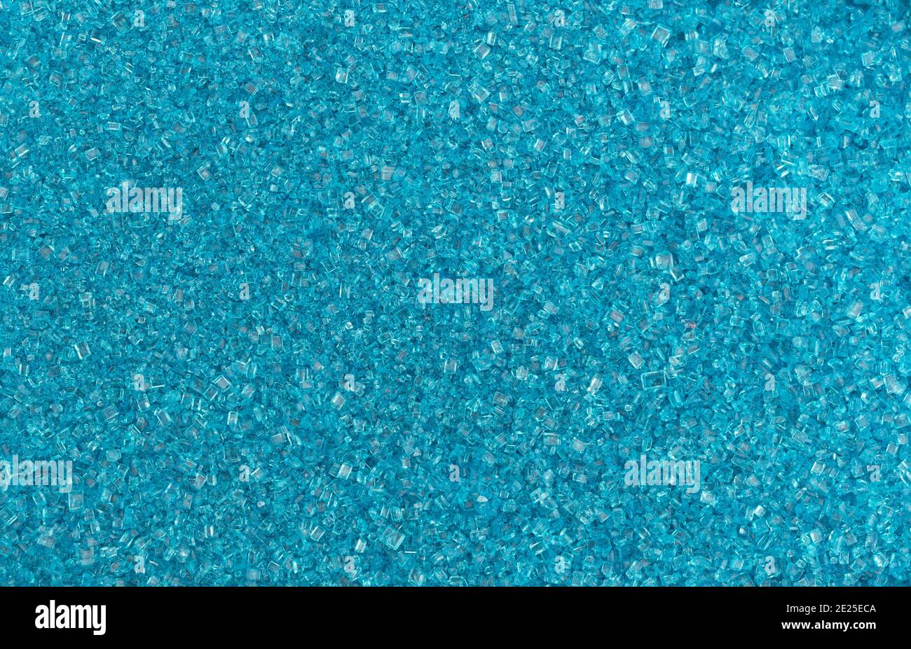 Close view of a portion of blue sanding sugar granules. Stock Photo