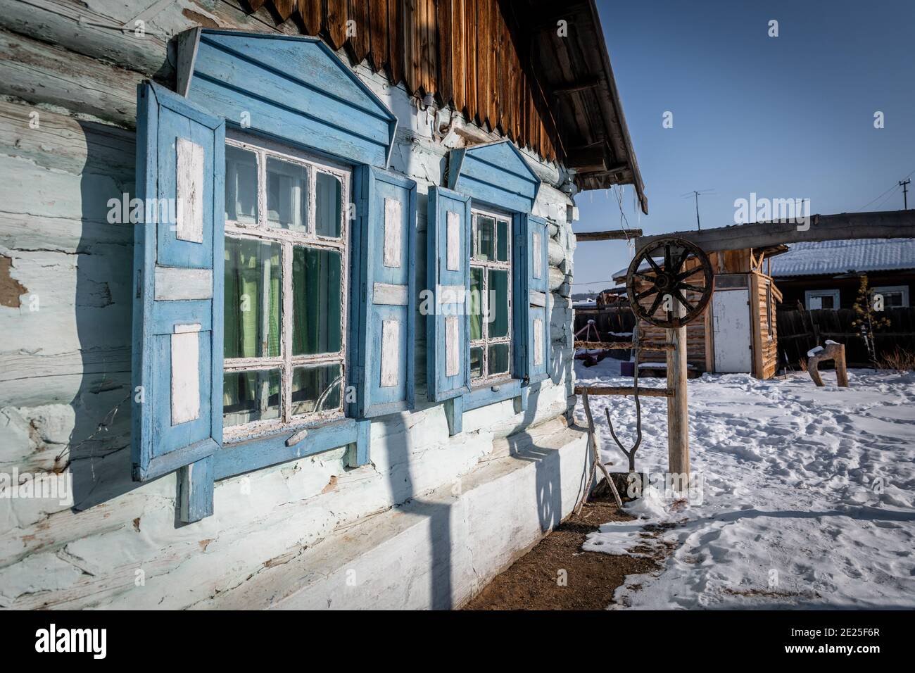 Typical house of Siberia near the Baikal lake in Siberia by winter
