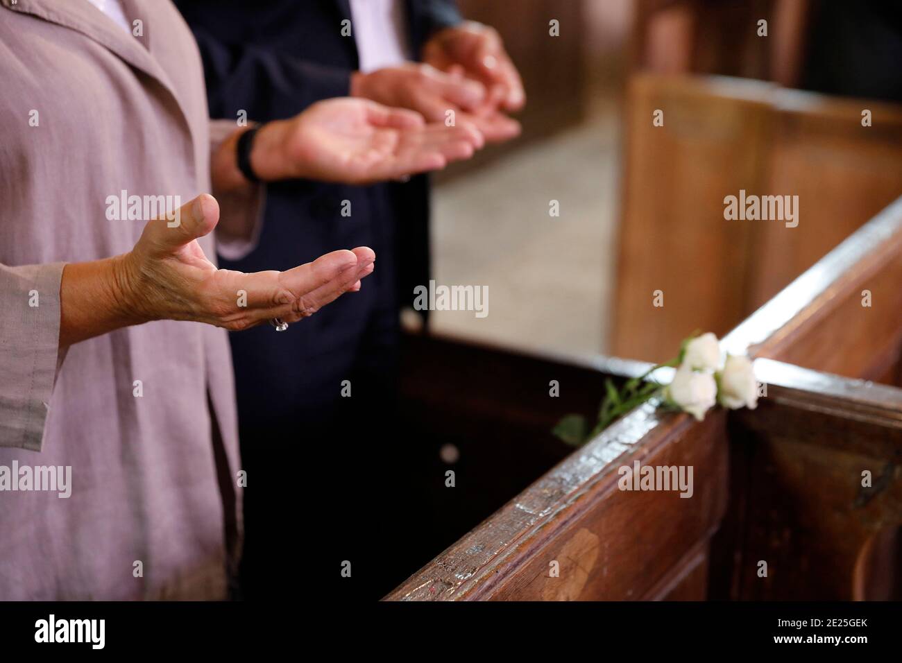 Catholic funeral in Gilles, Eure-et-Loir. Our Father prayer Stock Photo