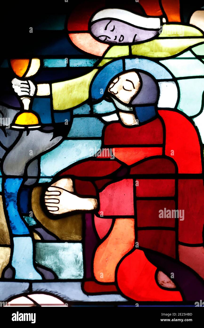 Sainte Therese church.   Stained glass window. Jesus praying in the garden of Gethsemane  after the Last Supper.  Jean Edouard de Castella. Stock Photo