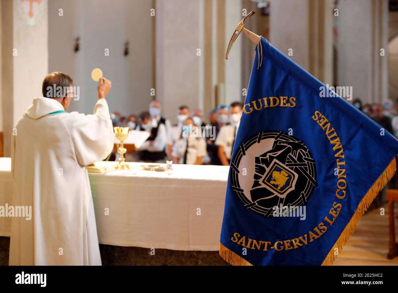 Catholic church during covid-19 epidemic. Sunday mass. Eucharistic celebration.  Saint Gervais. France. Stock Photo
