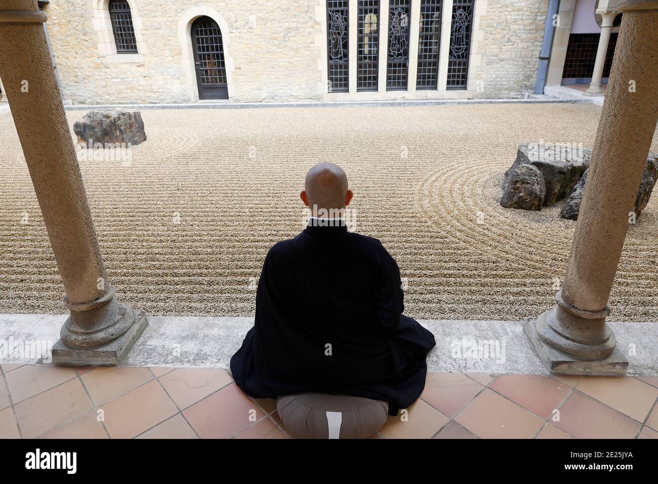 Zen buddhist monk practising zazen (meditation) in Orval trappist abbey ...