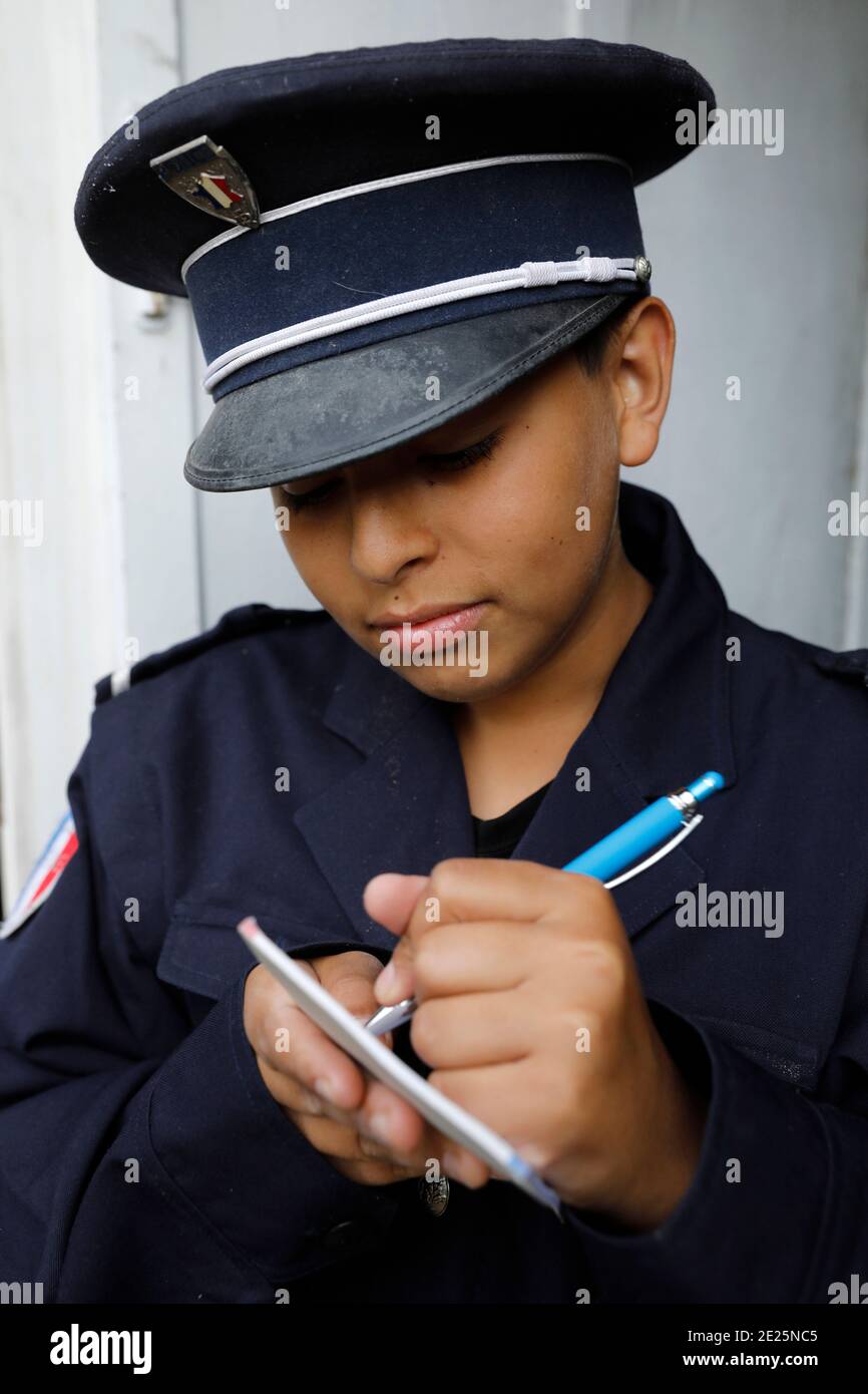 Boy pretending to be a French policeman. Eure, France. Stock Photo