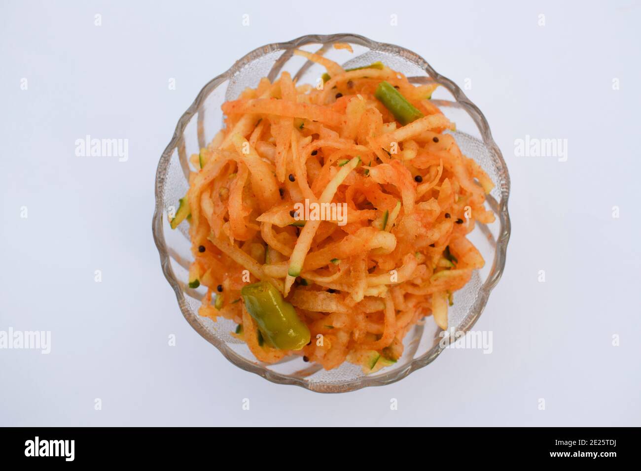 Raw papaya chutney, grated papaya is eaten with authentic gujarati