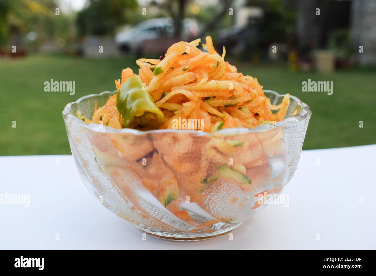 Raw papaya chutney, grated papaya is eaten with authentic gujarati