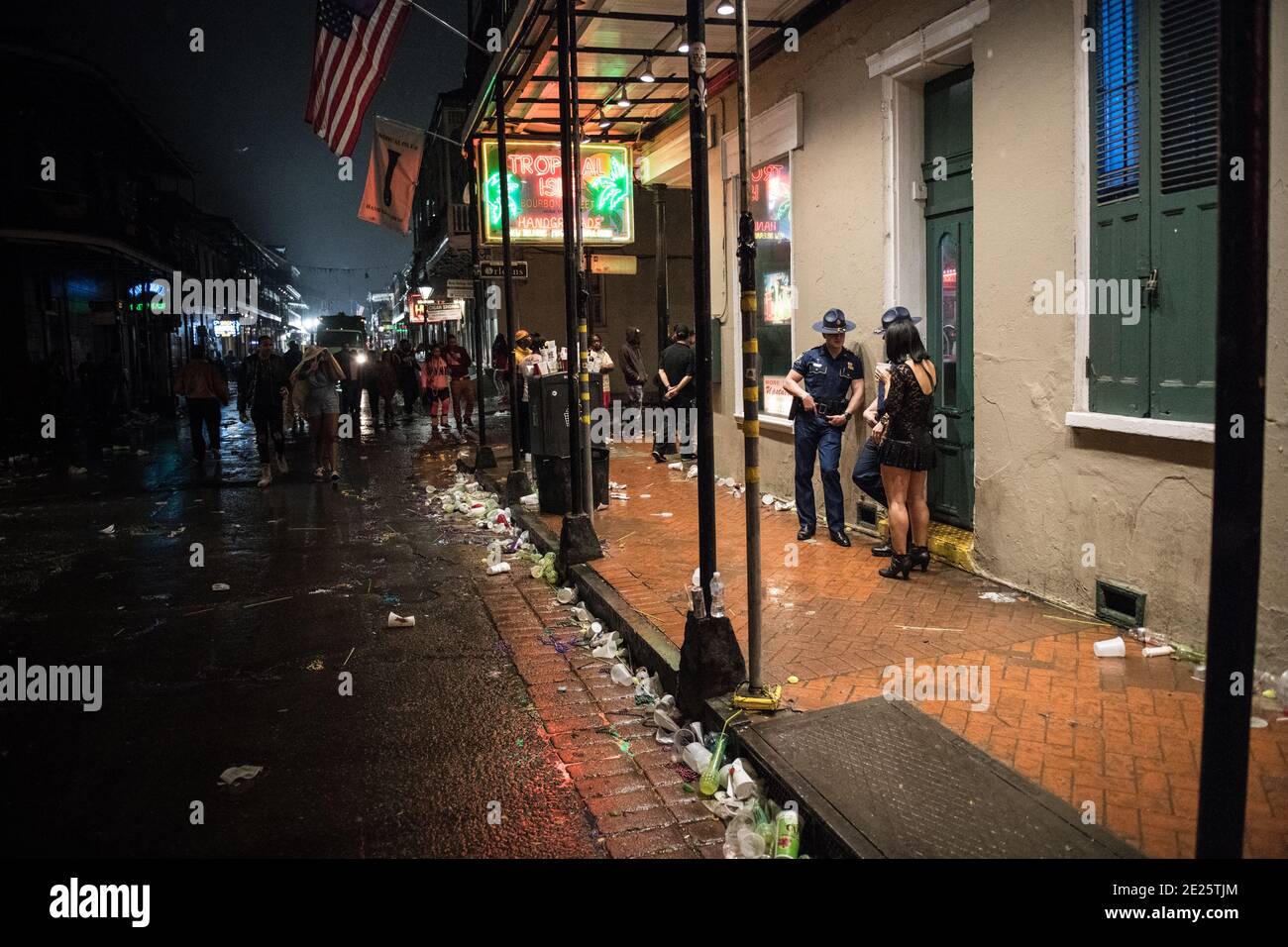 Police patrolling Bourbon Street Late Night early morning Mardi Gras, New Orleans, Louisiana, USA. Stock Photo