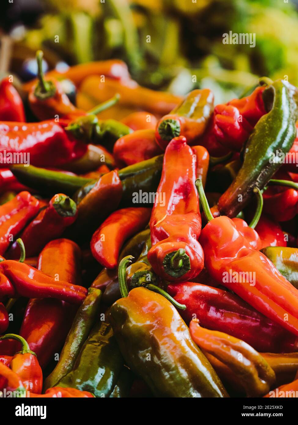 Red peppers in a market stall Stock Photo - Alamy