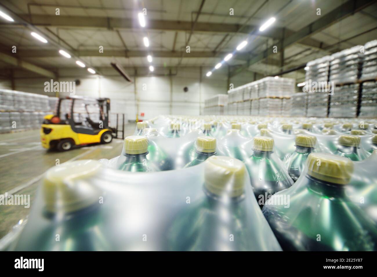 loader on the background of a huge industrial food warehouse with
