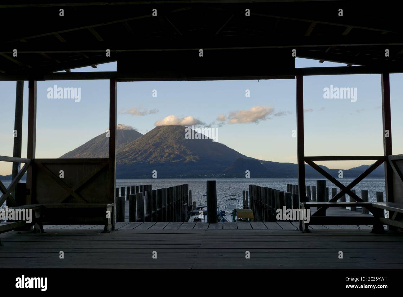 Guatemala, Central America: Lake Atitlán (Atitlan) with volcanos Atitlan and Toliman, sunrise with landing scape Stock Photo