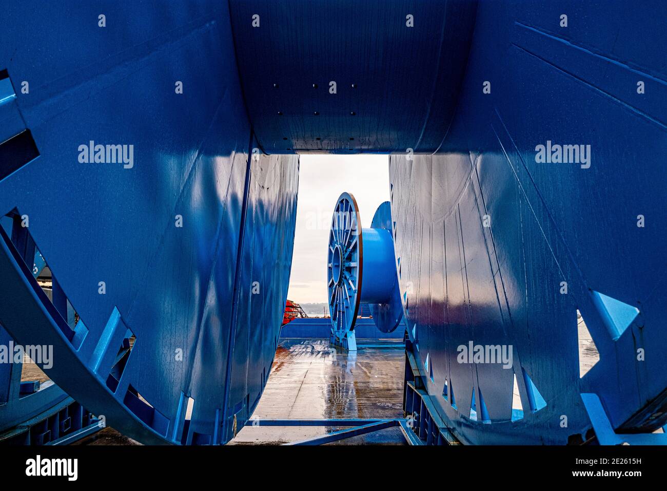 Large North Sea  reels being unloaded at dockside Stock Photo