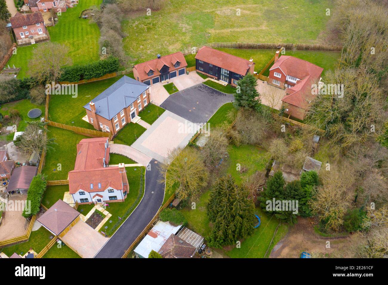 Aerial view of contemporary small housing development of five houses in