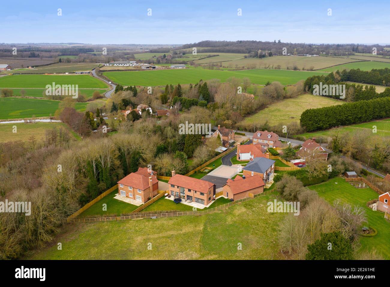 Aerial view of contemporary small housing development of seven houses in Kent landscape Stock Photo