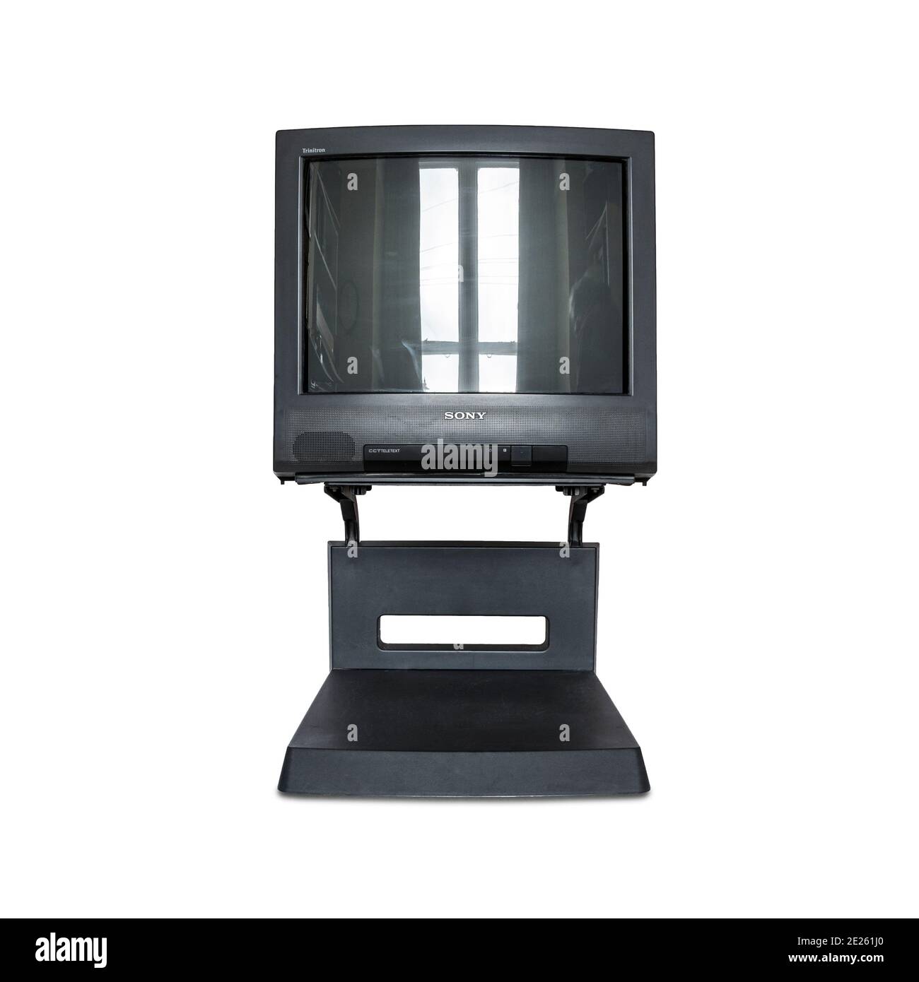 A 1996 black Sony Trinitron CRT television set on its stand, isolated against a white background Stock Photo