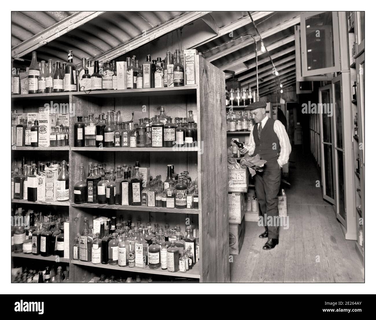 1920's Prohibition Alcohol Testing Washington, D.C., 1920. “Treasury Internal Revenue department.” An array of essences, extracts and elixirs being tested for alcohol content at the start of Prohibition in America USA Stock Photo