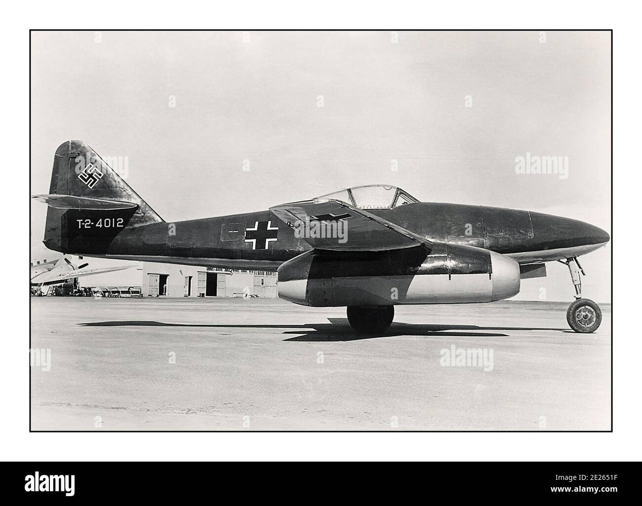 WW2 German Messerschmitt Me-262 jet fighter of the Nazi Luftwaffe 1945 Archive WW2 World War II  The Messerschmitt Me 262, nicknamed Schwalbe (German: 'Swallow') in fighter versions, or Sturmvogel (German: 'Storm Bird') in fighter-bomber versions, was the world's first operational jet-powered fighter aircraft, which had operational status with the Luftwaffe until mid-1944. The Me 262 was faster and more heavily armed than any Allied fighter.  One of the most advanced aviation designs in operational use during World War II Stock Photo