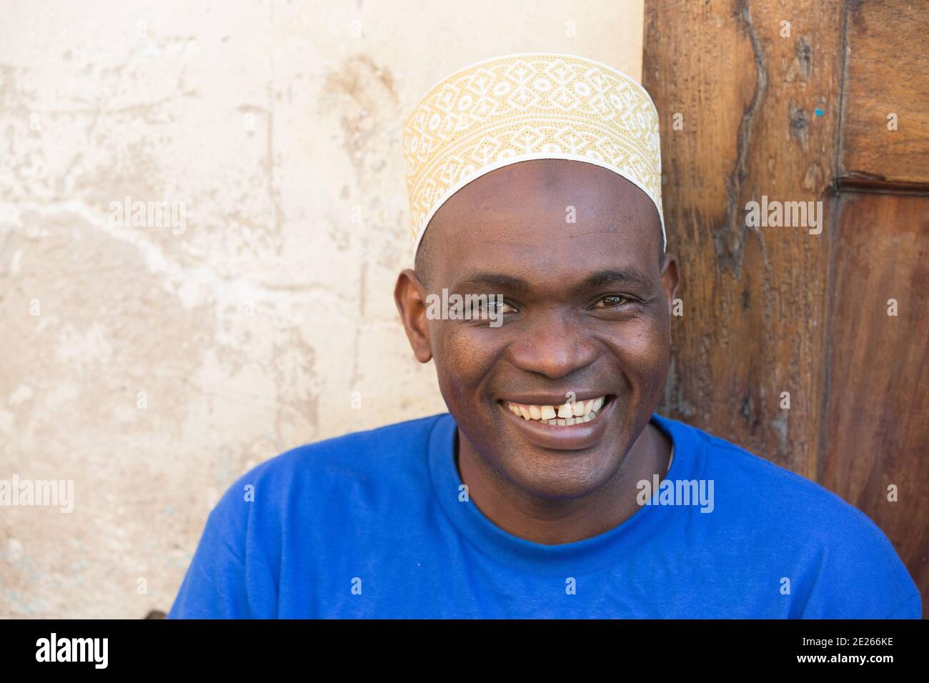 Stone Town, Zanzibar, Tanzania : Portrait of Man Wearing Kofia hat. Stock Photo