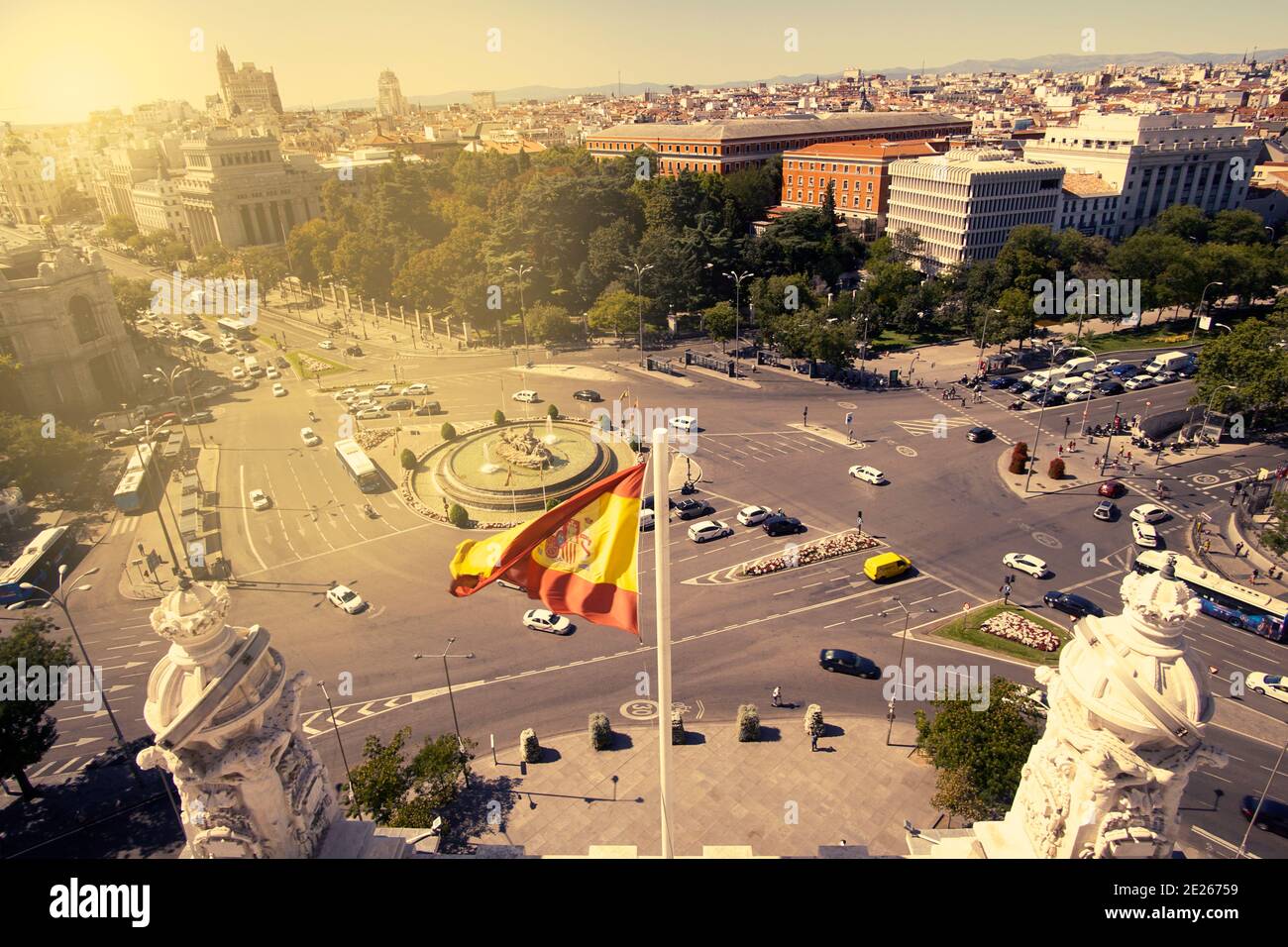 Panoramic view of Madrid, Spain with the Spanish flag in the foreground. Stock Photo